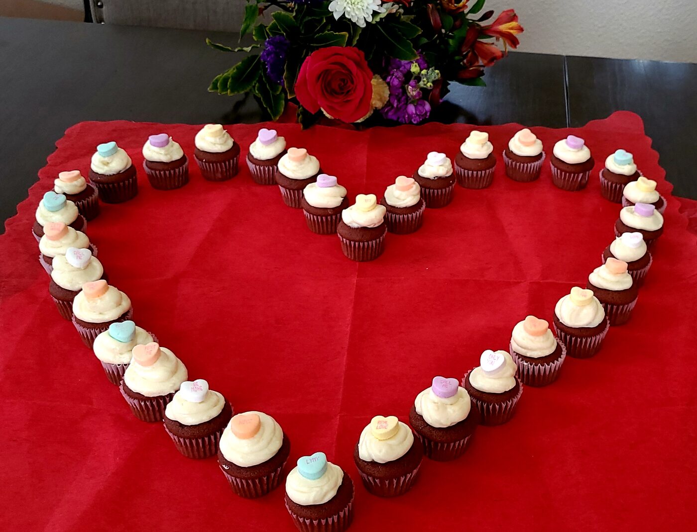 Mini red velvet conversation cupcakes